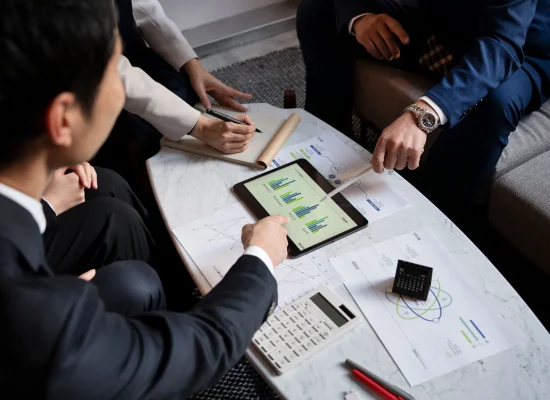 business-people-working-with-ipad-high-angle