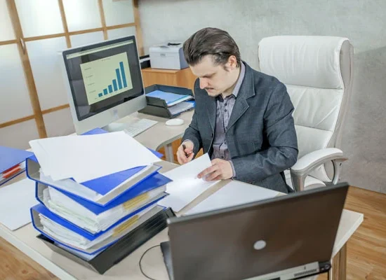 young-businessman-working-from-his-office-concept-hard-work-(1)